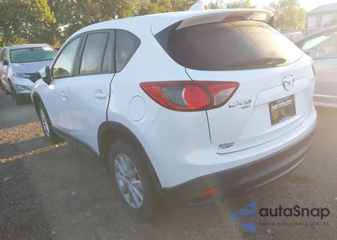 2013 Mazda Cx-5 Touring z USA, uszkodzony, nr VIN JM3KE4CEXD0105523